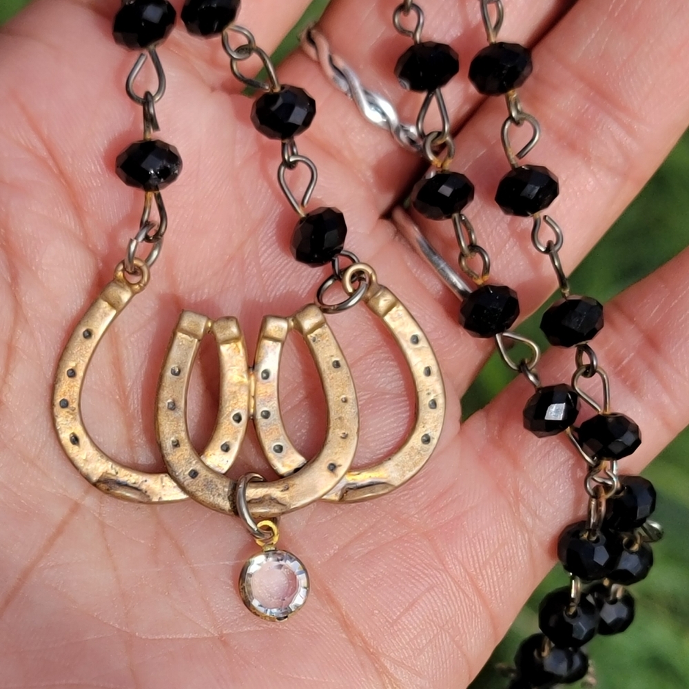 Vintage Victorian sterling silver gold plated triple horseshoe black glass bead